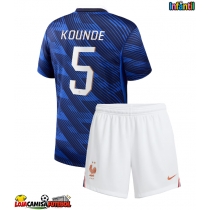 Camisa de Futebol França Jules Kounde #5 Equipamento Principal Infantil Mundo 2026 Manga Curta (+ Calças curtas)